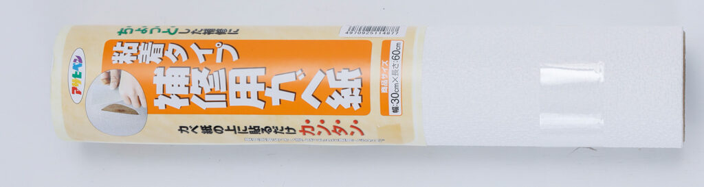 補修シートで壁にあいた大きい穴を補修する